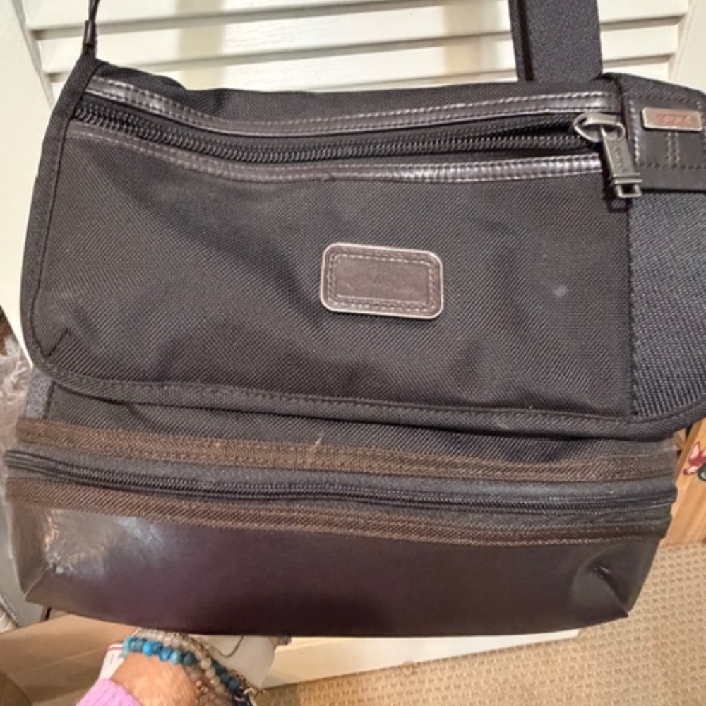 Tumi expandable travel crossbody bag